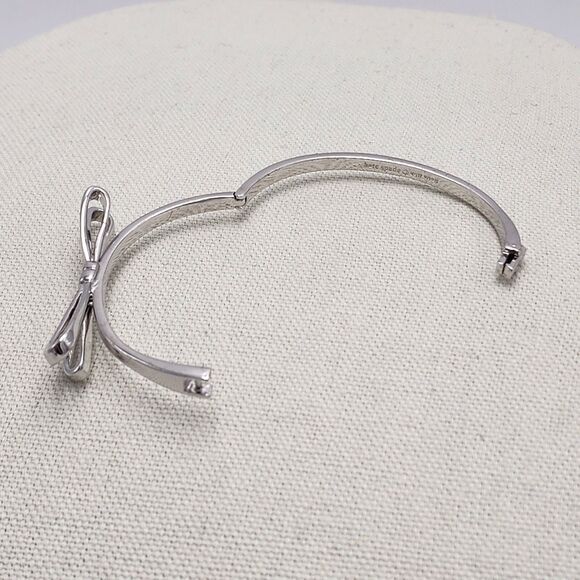Kate Spade Skinny Mini Double Bow Silver Bangle Bracelet - Picture 2 of 3